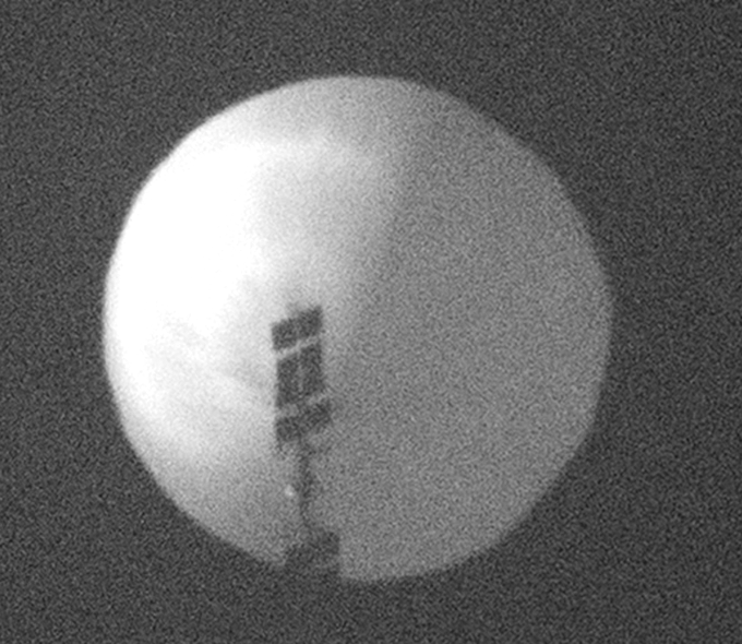 Suspected Chinese spy balloon found over northern U.S.. Defense Dept officials have debated whether to shoot it down!